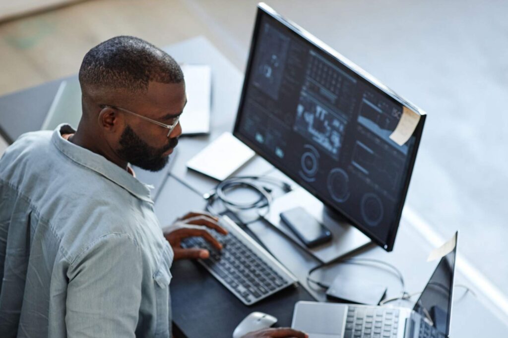 Developers collaborating on field service software UK solutions to enhance business performance and service automation.