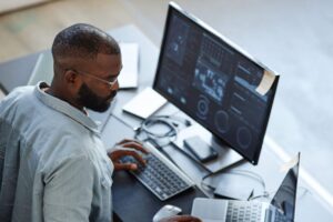 Developers collaborating on field service software UK solutions to enhance business performance and service automation.