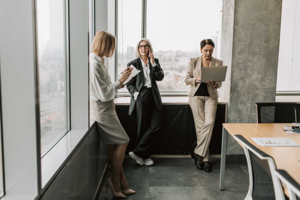 Business professionals collaborating with the best CRM for service based business to improve customer relationships, communication, and growth.