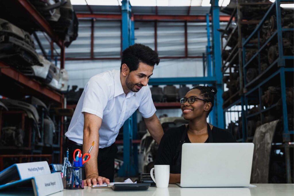 Team using ERP for service business to manage inventory, track assets, and improve operational visibility in a warehouse environment