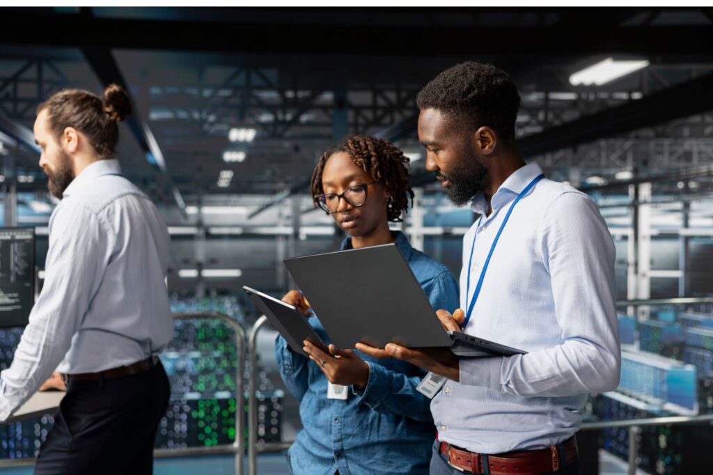 Professionals using work order management systems to monitor tasks, manage workflows, and improve operational visibility